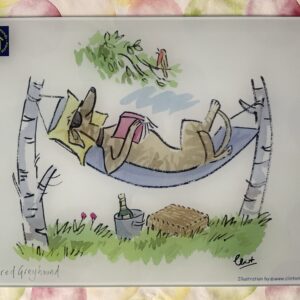 Retired Greyhound lazing on a hammock chopping board